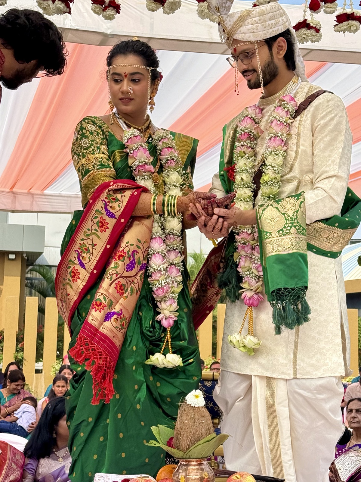 Maharashtrian bride and groom in traditional wedding attire