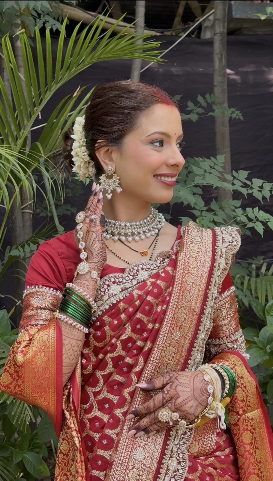 Party guest look with statement jewellery and glam makeup